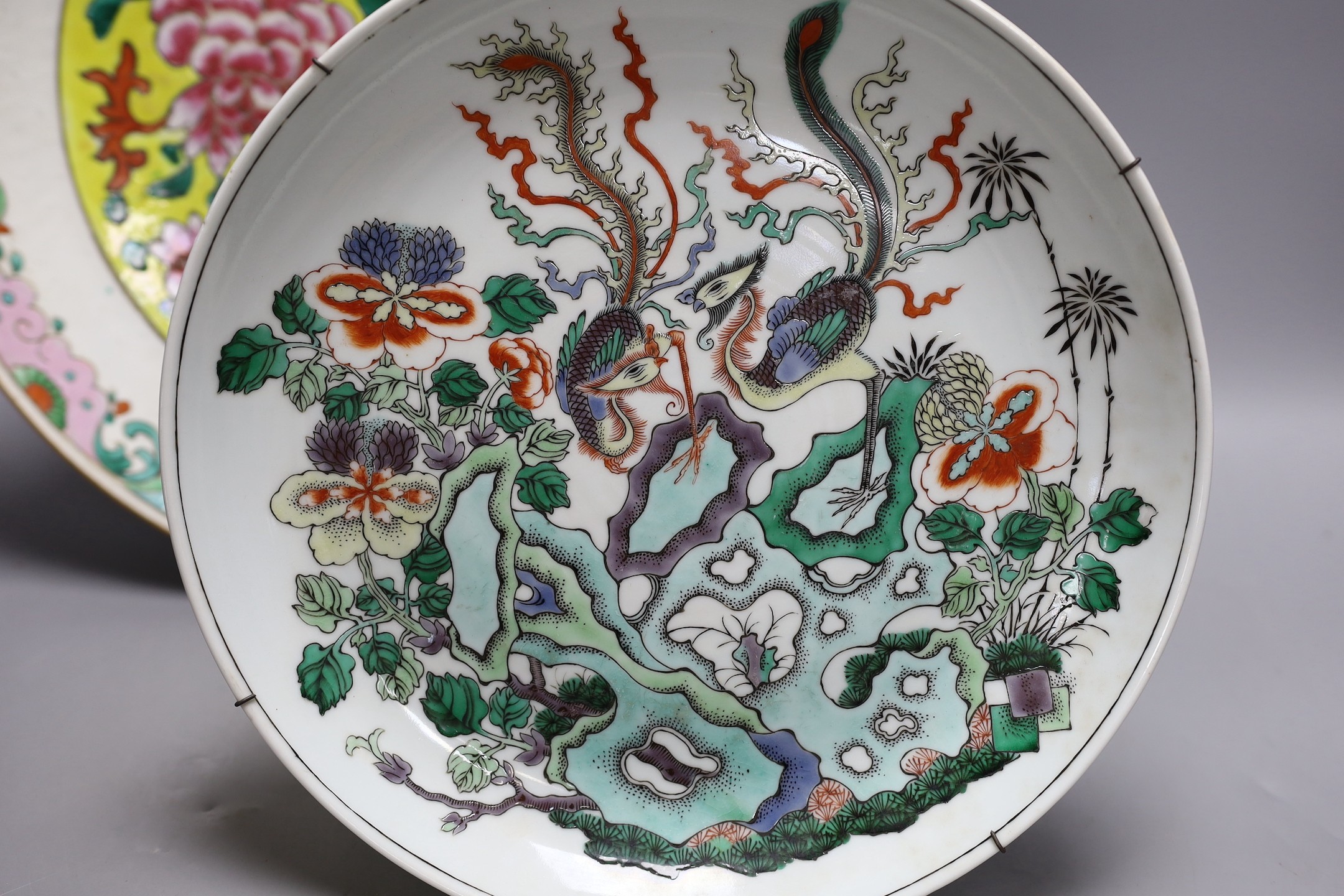 An early 20th century Chinese famille rose charger (a.f) and a Chinese famille verte dish. Largest 36cm